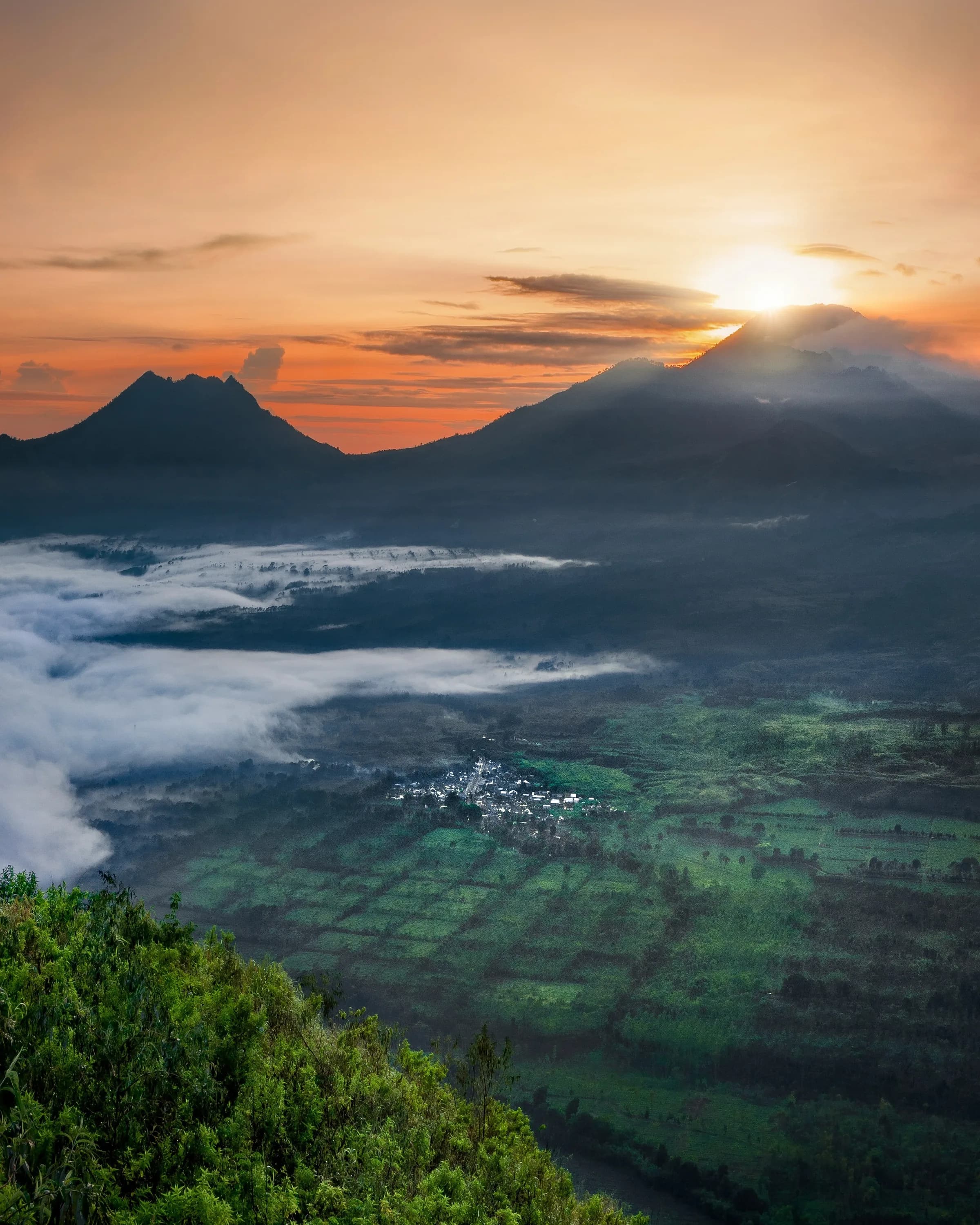First light over the mountains from Puncak Megasari