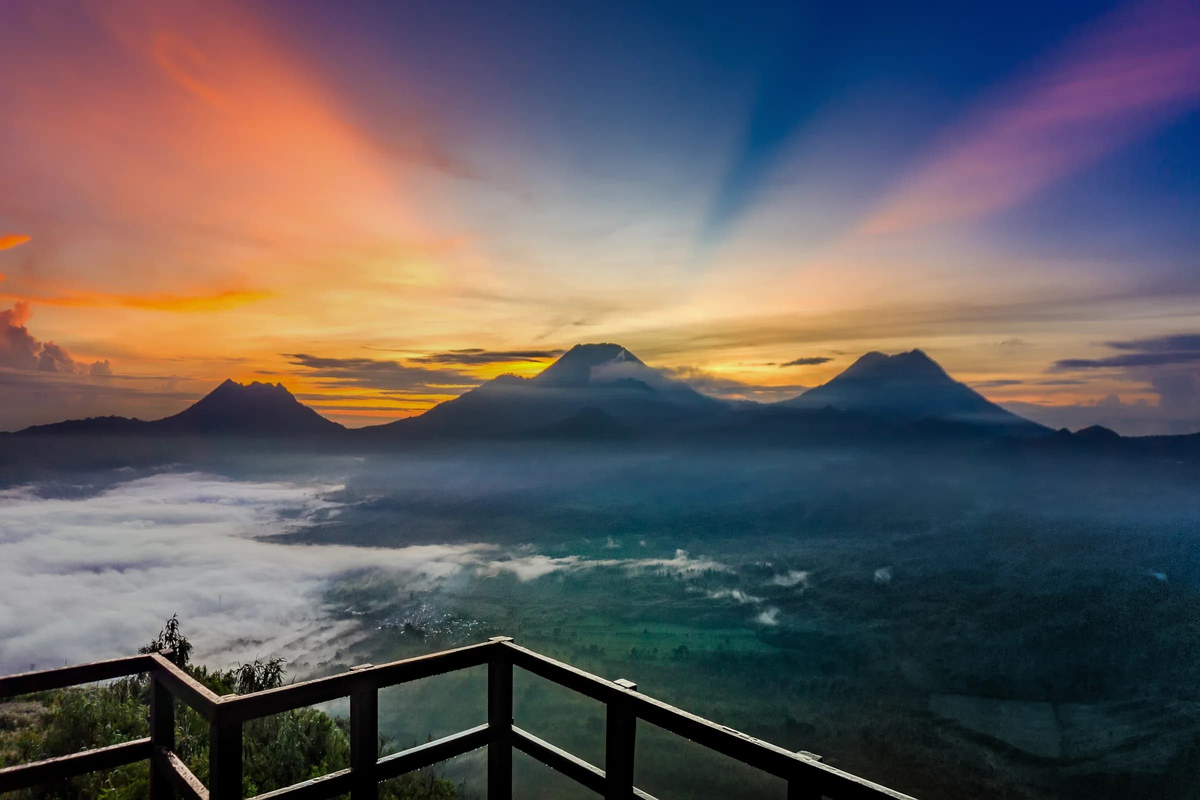 Sunrise panorama over a sea of clouds from Puncak Megasari